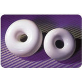 Two white medical-grade donut-shaped cushions on a purple background