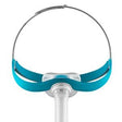 Nasal CPAP mask with blue headgear and flexible tube for sleep apnea therapy