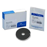 Medical foam dressing kit with box, sterile packet, and round foam roll on white background