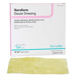 Xeroform gauze dressing box with yellow sterile medical dressing sheet in front