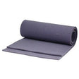 Rolled purple foam mat for medical or comfort support on white background