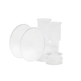 clear plastic breast pump parts on white background, essential medical supplies