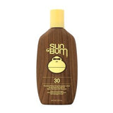 Sun Bum SPF 30 sunscreen lotion bottle with yellow cap and brown wood grain design