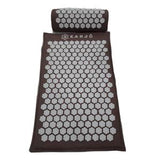 Brown acupressure mat and pillow set with white hexagonal spikes for pain relief