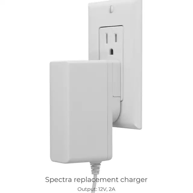 Spectra replacement charger plugged into wall outlet, 12V 2A power adapter