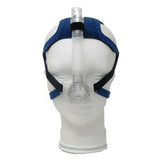 CPAP nasal mask with headgear on mannequin, sleep apnea therapy medical device