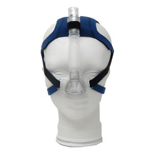 CPAP nasal mask with headgear on mannequin, sleep apnea therapy medical device