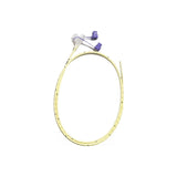 Yellow medical feeding tube with dual connectors for home healthcare use on white background.