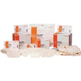 Assorted sterile medical dressings and wound care supplies in packaging, group arrangement