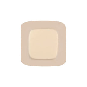 Sterile square medical adhesive wound dressing with beige border on white background