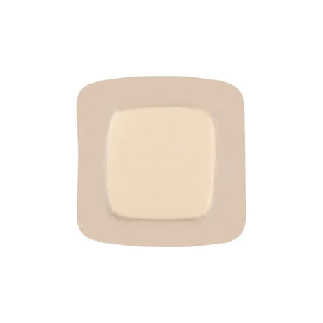 Sterile square medical adhesive wound dressing with beige border on white background