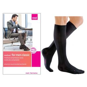 Black men's medical compression socks with packaging showing a businessman wearing them