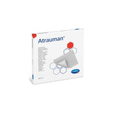 Atrauman sterile non-adherent wound dressing box with product image and medical symbols.
