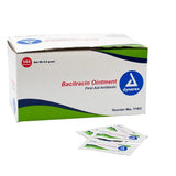Box of Dynarex Bacitracin Ointment antibiotic packets for wound care, shown on white background