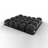Black medical air cushion with interconnected inflated cells for pressure relief