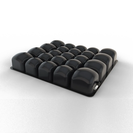 Black medical air cushion with interconnected inflated cells for pressure relief