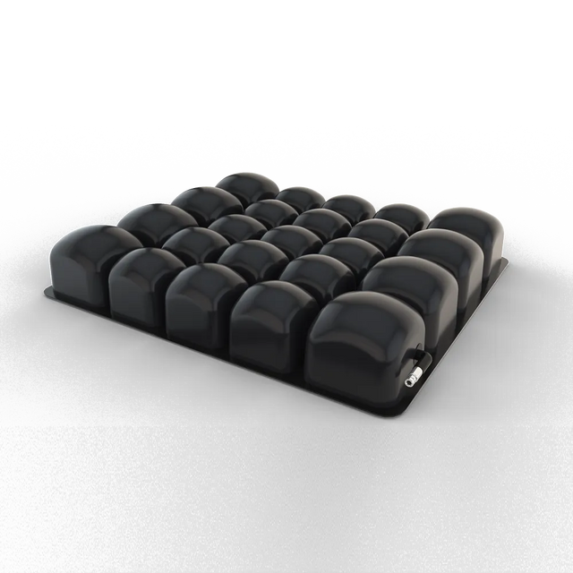 Black medical air cushion with interconnected inflated cells for pressure relief