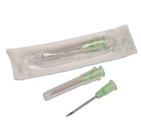 Sterile hypodermic needles with green hubs and protective caps, one in packaging