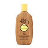 Sun Bum SPF 50 sunscreen lotion bottle with yellow cap and woodgrain design