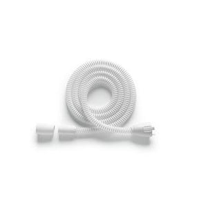 White coiled CPAP hose for medical respiratory equipment on plain background