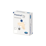 Box of Proximel Ag Silver silicone foam dressing for wound care, angled view