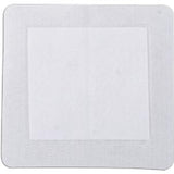 Sterile adhesive medical wound dressing pad on white background