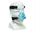 Full face CPAP mask with adjustable straps on mannequin for sleep apnea therapy