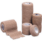 Beige cohesive medical bandage rolls for wound care and support