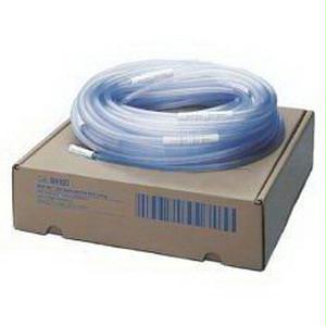 Coiled clear medical tubing on a cardboard box, home medical supply delivery
