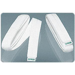 Three white elastic medical bandages on a gray surface, for healthcare use
