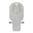 Transparent adhesive medical sensor patch for glucose monitoring, isolated on white background.