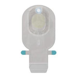 Transparent adhesive medical sensor patch for glucose monitoring, isolated on white background.