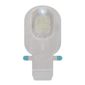 Transparent adhesive medical sensor patch for glucose monitoring, isolated on white background.