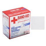 Box of BAND-AID large gauze sponges for medical wound care with single gauze pad shown