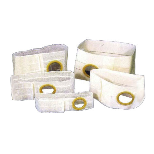 Different sizes of white ostomy belts with circular openings for medical use