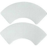 Two semicircular adhesive medical patches on a white background, wound care supplies