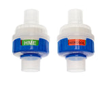 Two medical breathing filters labeled HME and AEROSOL for respiratory therapy use