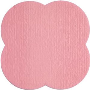 Pink medical adhesive patch with textured surface and rounded edges on white background