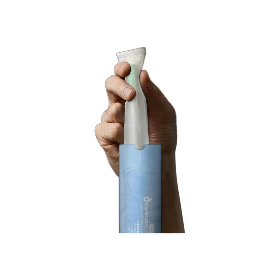 Hand holding a CompactCath hydrophilic intermittent catheter in blue packaging