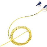 Yellow medical feeding tube with blue connectors, coiled for home medical supply use