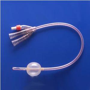 medical silicone catheter with balloon and triple connector on blue background