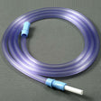 Transparent medical tubing with blue connectors on a gray perforated surface