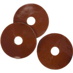Three brown adhesive ostomy barrier rings for medical supplies