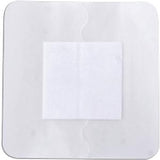 Sterile adhesive wound dressing with white absorbent pad on transparent square backing