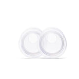 Two transparent circular medical adhesive patches for home medical supply use