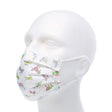 Mannequin head wearing a white medical face mask with colorful cartoon animal prints