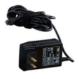 Black medical device power adapter with attached cord on white background