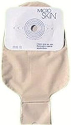 Beige medical ostomy pouch with adhesive barrier and cut-to-fit opening for stoma care.