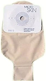 Beige medical ostomy pouch with adhesive barrier and cut-to-fit opening for stoma care.