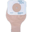 Ostomy pouch with beige barrier and round cutout, medical supply for stoma care